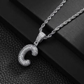 Macro shot of silver letter C pendant with pavé cubic zirconia on a twisted rope chain - Letter C (20inch Silver Rope Chain)