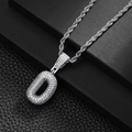 Close-up of sparkling iced out letter D pendant with silver rope chain on black stand - Letter D (20inch Silver Rope Chain)