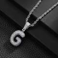 Macro detail of iced-out letter G hip hop pendant with sparkling zircon inlays - Letter G (20inch Silver Rope Chain)