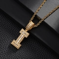 Macro detail of gold-plated letter I pendant with pave-set cubic zirconia on rope chain - Letter I Style