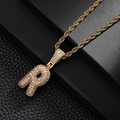 Detail of Letter R pendant in gold finish with sparkling pavé zircons on a rope chain - Letter R Style