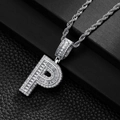 Macro detail of silver hip hop letter P pendant with micro-paved cubic zirconia - Letter P
