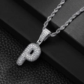 Macro shot of silver hip-hop letter P pendant with micro-paved zircons on a rope chain - Letter P (20inch Silver Rope Chain)