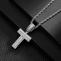 Close-up of hip hop silver T-letter pendant encrusted with cubic zirconia on a rope chain - Letter T
