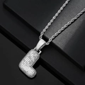 Detailed macro view of iced-out bubble letter J pendant with silver rope chain - Letter L / Silver