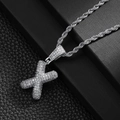 Close-up of hip hop letter X pendant with shiny zircon stones on silver rope chain - Letter X (20inch Silver Rope Chain)