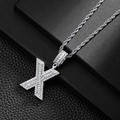 Detail of hip-hop silver X pendant with baguette cubic zirconia on a thick rope chain - Letter X