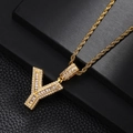Detailed close-up of gold-plated letter Y pendant with inlaid cubic zirconia on rope chain - Letter Y Style