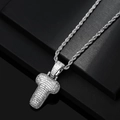 Macro detail of iced-out silver letter T pendant with zircon on a sturdy rope chain - Letter T / Silver