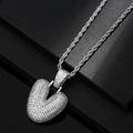 Macro view of iced out heart pendant with white zircons and silver rope chain - Letter V / Silver