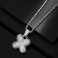 Macro view of iced out silver X-shaped pendant with cubic zirconia and rope chain - Letter X / Silver