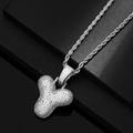 Macro shot of silver-tone bubble letter Y pendant with zircons and twist rope chain - Letter Y / Silver