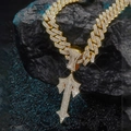 Detailed close-up of iced out Cuban link necklace with a crystal T letter pendant - 45cm-18inch+Pendant / Gold