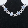 Detail of hip-hop clover necklace with blue marquise gems and sparkling pavé crystals - Silver/Blue Zirconia