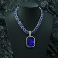Icy Cuban chain necklace with emerald-cut deep blue gemstones and silver metal setting - Blue Gemstone Pendant With Cuban Chain / Silver