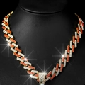 Hip hop gold Cuban chain necklace with alternating red and clear crystals in macro view - Gold And Orange Red Necklace