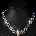 Cuban link necklace with alternating blue and white rhinestones on a black neck bust - Gold And Dark Blue Necklace