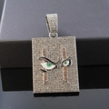 Macro shot of iced out rectangle hip hop pendant with green eye pattern on black box - Single Pendant (No Chain) / Silver