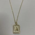 Gold letter A pendant necklace with rectangular zircon and cream enamel inlay - Letter A