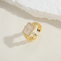 Detailed macro of the pave-set cubic zirconia rectangular face on gold watch-style ring - Adjustable Open / Gold Watch Style (JZ0303-5)