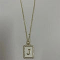 Gold letter J pendant necklace with white enamel inlay and sparkling zircon crystals - Letter J