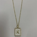 Gold letter K necklace with white enamel rectangular pendant and zircon border inlay - Letter K