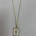 Gold-plated rectangular necklace with letter S pendant, white enamel and zircon border - Letter S