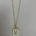 Golden necklace with V-letter pendant, white enamel and sparkling zircon border inlay - Letter V