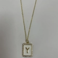 Gold plated initial necklace featuring letter Y pendant with white enamel and zircons - Letter Y