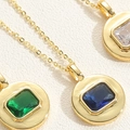 Close-up of geometric square zircon pendants in gold settings on O-chains for women - Royal Blue Zirconia