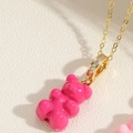 Macro detail of gummy bear pendant with rose pink resin and gold zircon clasp - Rose Red (XL2599-7)