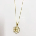 14K gold plated Leo zodiac pendant necklace with sparkling cubic zirconia on white background - Leo / Gold