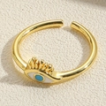 Macro shot of gold plated evil eye ring with blue enamel and fine eyelash details - Adjustable Open / Evil Eye Style (JZ0323-4)
