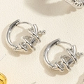 Detailed macro view of silver twisted hoop earrings with a metallic woven texture finish - Silver Twisted Braid Hoop (ES2348-3)