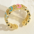 Detail of gold open ring with colorful enamel inlay and sparkling zircon stones - Adjustable Open / Colorful