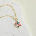 Collana a forma di stella con malocchio in smalto colorato su superficie in pietra - Stella Rosa