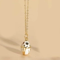 Detail of egg-shaped enamel pendant with golden leaf relief and O-chain design - White (MA1-8)