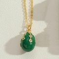 Luxurious gold-tone O-chain necklace featuring a green egg-shaped enamel drop pendant - Green