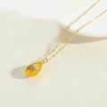 Elegant gold necklace with sparkling zircon lemon pendant and textured finish detail - Yellow