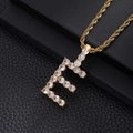 Macro detail of gold-plated letter E pendant with clear zircon pave on a rope chain - Letter E (Rope Chain) / Gold