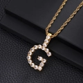 Close-up of golden letter G pendant with inlaid cubic zirconia on rope chain - Letter G (Rope Chain) / Gold