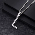 Close-up of silver letter L pendant with pavé cubic zirconia on twist rope chain - L-Silver