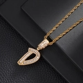 Macro shot of gold rope chain with a baguette-cut zircon encrusted letter D pendant - Letter D (5507837524615)