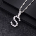 Macro shot of silver-colored capital S pendant with clear zircon pave and rope chain - S-Silver