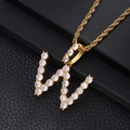 Macro view of iced out pave zircon letter W pendant with golden rope chain - Letter W (Rope Chain) / Gold