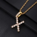 Macro shot of gold hip hop necklace featuring letter X pendant with clear zircons - Letter X (Rope Chain) / Gold