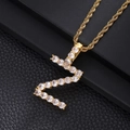 Close-up of golden letter S pendant necklace encrusted with sparkling cubic zirconia - Letter Z (Rope Chain) / Gold