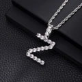 Macro shot of silver hip hop letter S pendant with zircon inlay and rope chain - Z-Silver