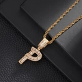 Macro view of gold plated twisted rope chain with iced out letter P cubic zirconia pendant - Letter P (5507837524627)