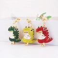 Three cute dinosaur keychains with colorful rhinestones on golden alloy hooks - Mixed Colors (Random)